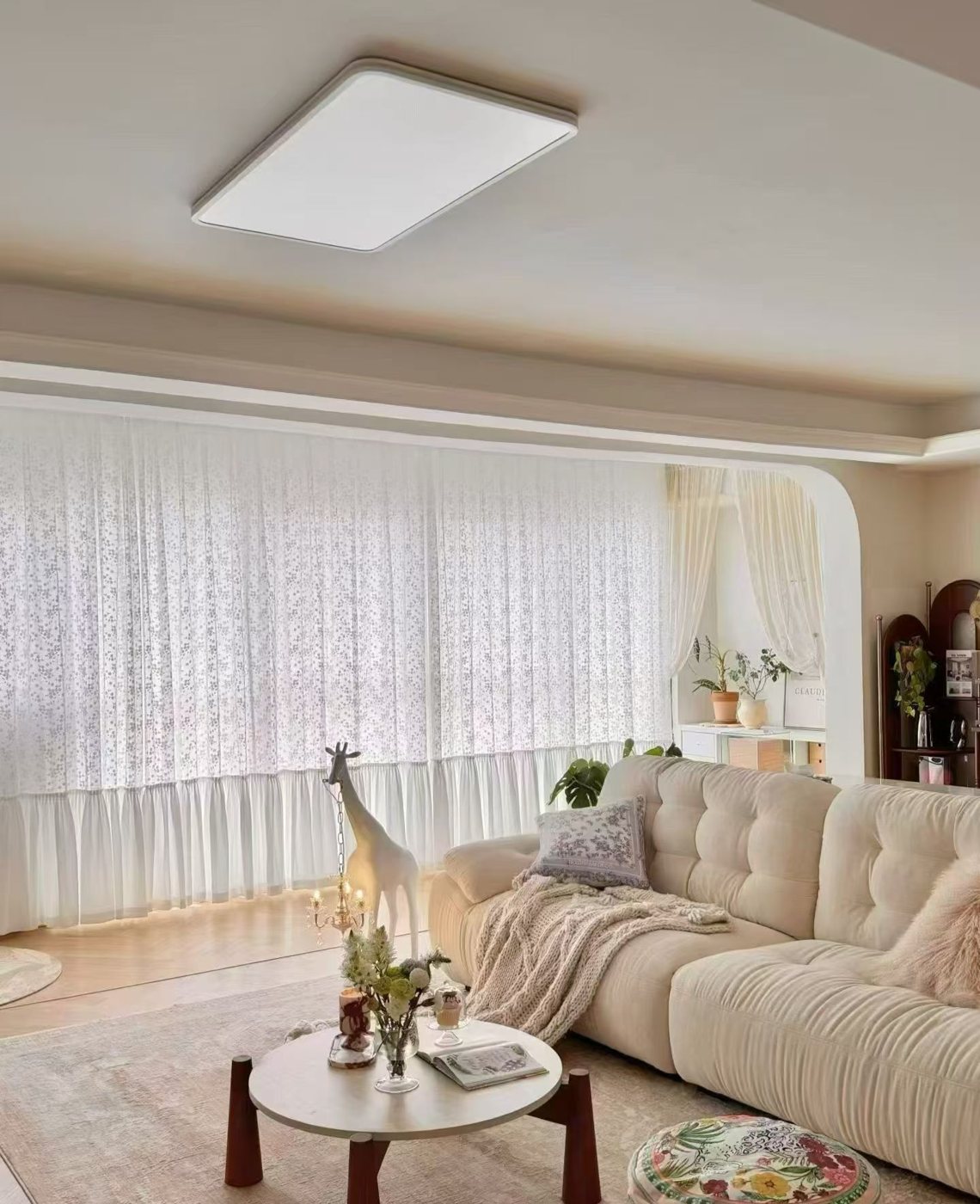 Sheer curtains in a sunlit living room